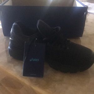 Brand new black ASICS never been worn